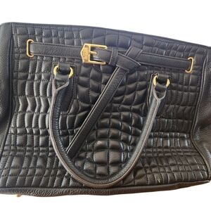 Luxurious Black Quilted Clutch with Silver Accents